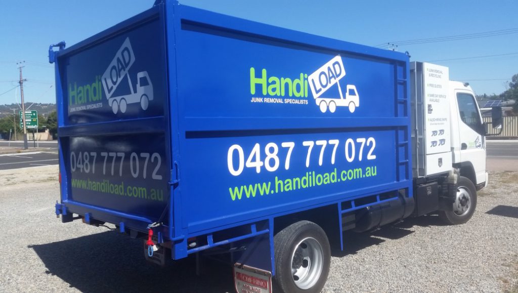Truck with new business vehicle sign on it.