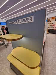 Side/end view of an advertising display inside a shopping centre